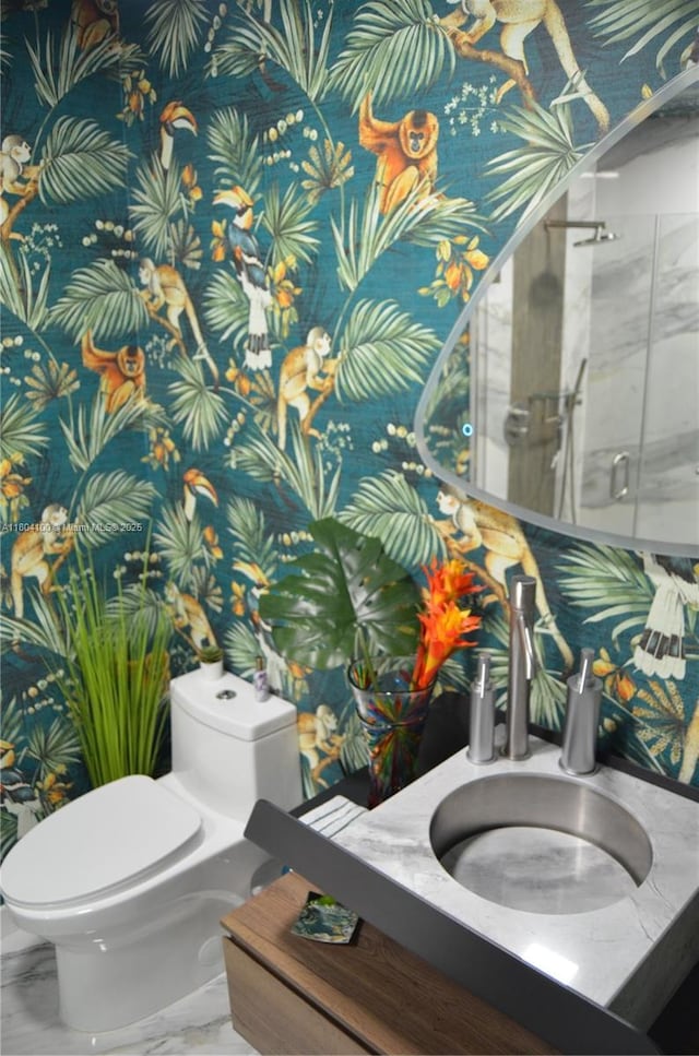 3629 Estepona Ave, Doral, FL 33178 - bathroom with toilet, marble finish floors, and vanity