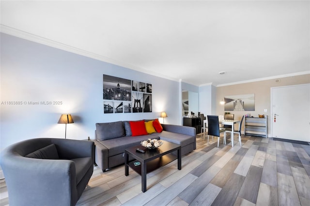 400 Kings Point Dr Unit 1021, Sunny Isles Beach, FL 33160 - living room featuring wood finished floors and crown molding
