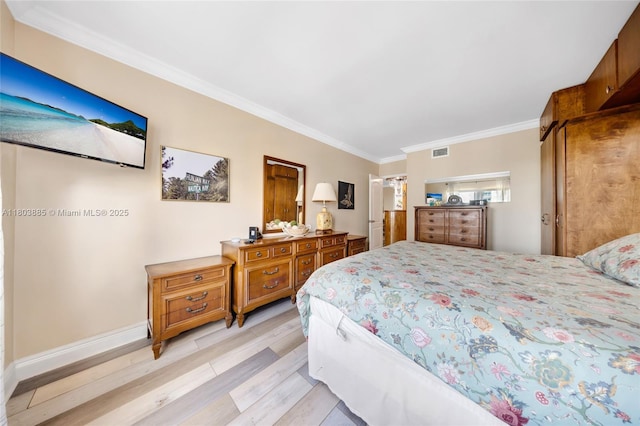 400 Kings Point Dr Unit 1021, Sunny Isles Beach, FL 33160 - bedroom with light wood-style flooring, crown molding, and baseboards
