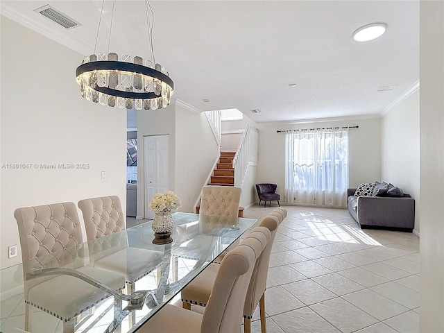 16435 SW 27th St, Miramar, FL 33027 - dining room with stairway, crown molding, a chandelier, light tile patterned floors, and baseboards