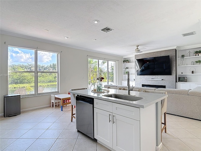 16435 SW 27th St, Miramar, FL 33027 - kitchen with a sink, dishwasher, light tile patterned floors, healthy amount of natural light, and ornamental molding