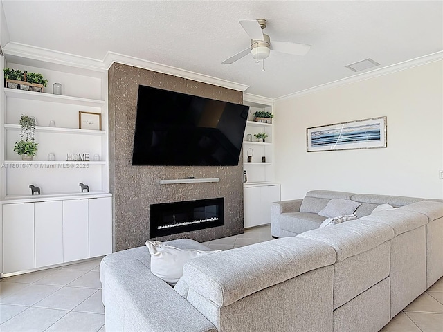 16435 SW 27th St, Miramar, FL 33027 - living area featuring light tile patterned flooring, built in features, ornamental molding, ceiling fan, and a fireplace