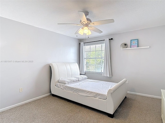 16435 SW 27th St, Miramar, FL 33027 - bedroom with carpet floors, a textured ceiling, baseboards, and ceiling fan