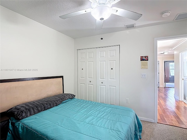 16435 SW 27th St, Miramar, FL 33027 - bedroom with baseboards, a closet, ceiling fan, and light carpet