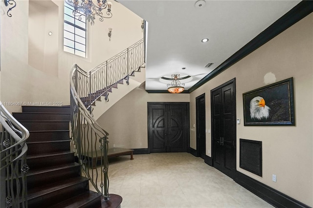 20508 SW 140th Ave, Miami, FL 33177 - foyer with stairs, baseboards, crown molding, recessed lighting, and a chandelier