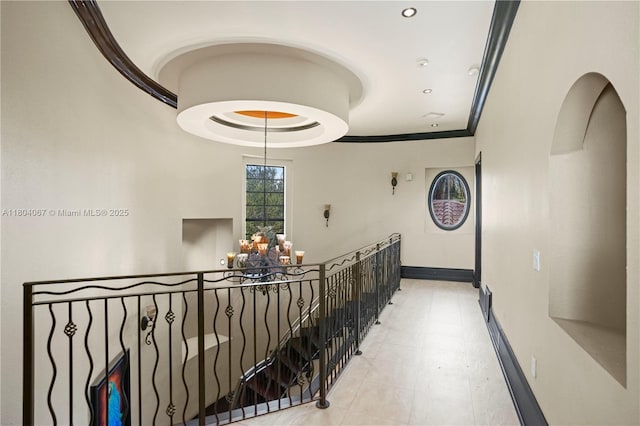 20508 SW 140th Ave, Miami, FL 33177 - hallway with baseboards, an upstairs landing, a tray ceiling, and recessed lighting