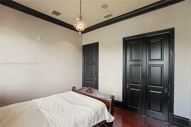 20508 SW 140th Ave, Miami, FL 33177 - bedroom featuring dark wood-type flooring and crown molding
