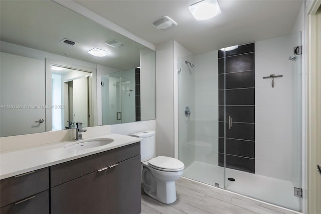 321 NE 26th St Unit 614, Miami, FL 33137 - full bath with a stall shower, vanity, and wood finished floors