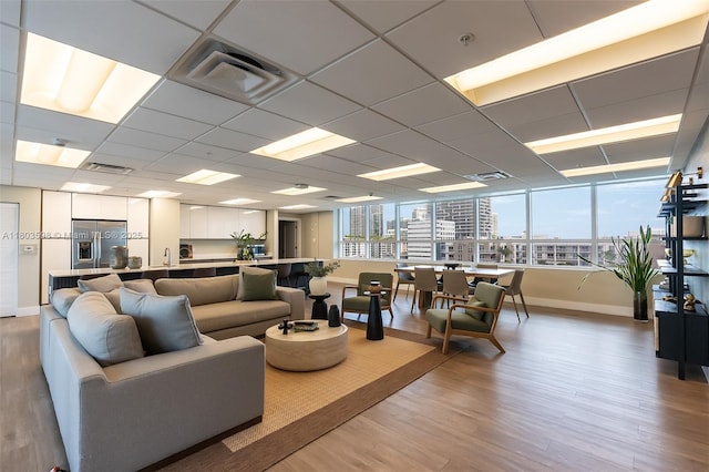 321 NE 26th St Unit 614, Miami, FL 33137 - living room featuring light wood-style flooring and a city view