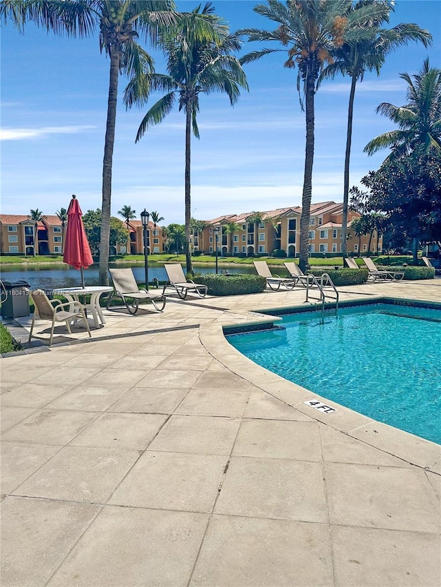 2240 E Preserve Way Unit 205, Miramar, FL 33025 - community pool featuring a patio and a residential view
