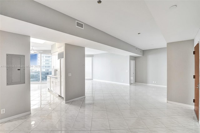 3200 N Ocean Blvd Unit 1206, Fort Lauderdale, FL 33308 - unfurnished room with electric panel, baseboards, a ceiling fan, and light tile patterned flooring
