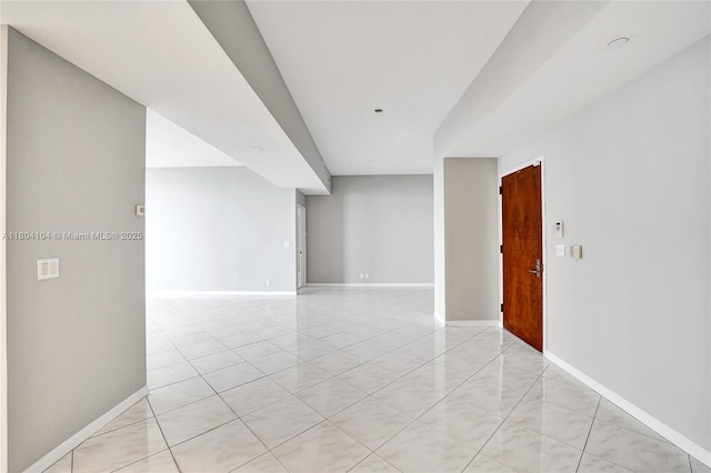 3200 N Ocean Blvd Unit 1206, Fort Lauderdale, FL 33308 - unfurnished room featuring baseboards and light tile patterned flooring