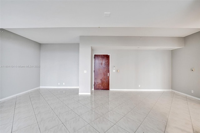 3200 N Ocean Blvd Unit 1206, Fort Lauderdale, FL 33308 - spare room with baseboards and light tile patterned flooring