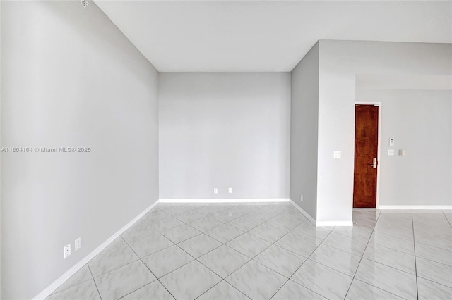 3200 N Ocean Blvd Unit 1206, Fort Lauderdale, FL 33308 - spare room featuring light tile patterned floors and baseboards