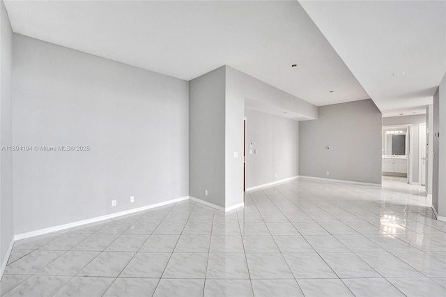 3200 N Ocean Blvd Unit 1206, Fort Lauderdale, FL 33308 - spare room featuring light tile patterned flooring and baseboards