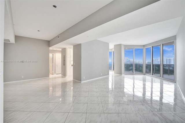 3200 N Ocean Blvd Unit 1206, Fort Lauderdale, FL 33308 - unfurnished room with light marble finish flooring and baseboards