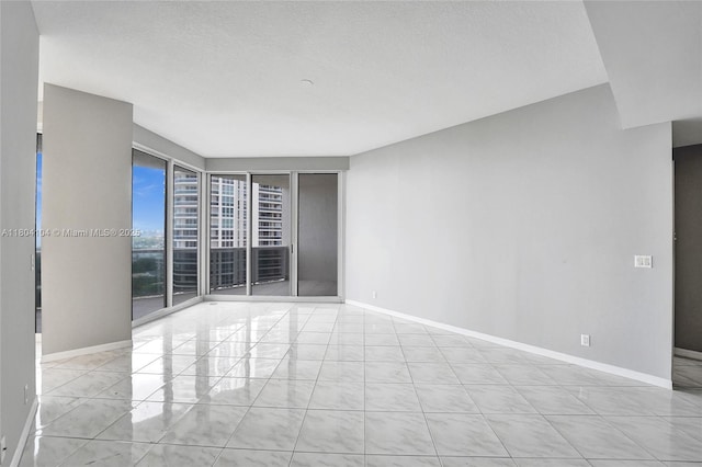 3200 N Ocean Blvd Unit 1206, Fort Lauderdale, FL 33308 - empty room with baseboards
