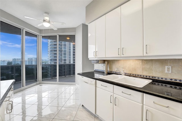 3200 N Ocean Blvd Unit 1206, Fort Lauderdale, FL 33308 - kitchen with a sink, white dishwasher, ceiling fan, and decorative backsplash