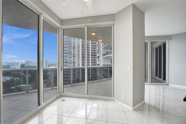 3200 N Ocean Blvd Unit 1206, Fort Lauderdale, FL 33308 - unfurnished room with a ceiling fan, a city view, and baseboards