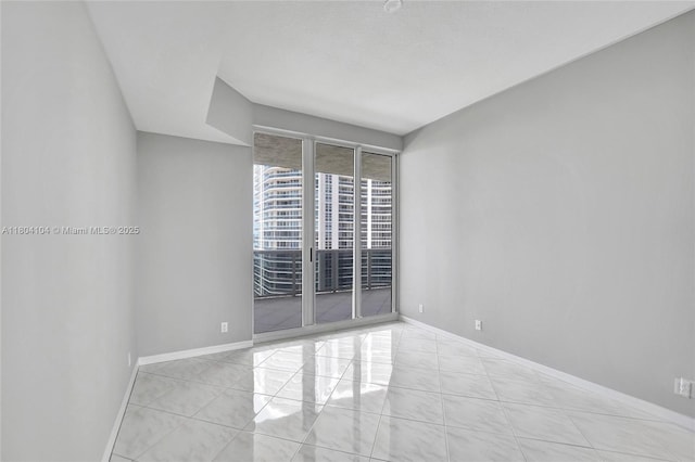 3200 N Ocean Blvd Unit 1206, Fort Lauderdale, FL 33308 - unfurnished room featuring baseboards
