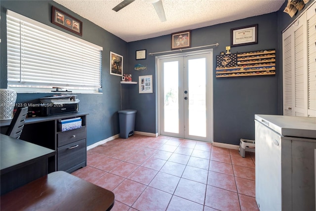 22226 SW 65th Ter, Boca Raton, FL 33428 - doorway with french doors, a ceiling fan, a textured ceiling, baseboards, and light tile patterned flooring