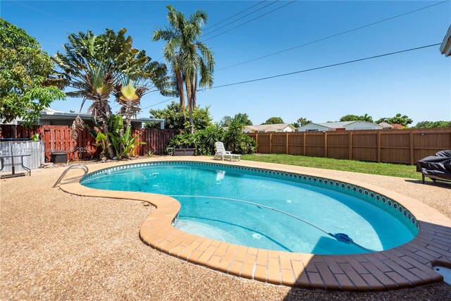 22226 SW 65th Ter, Boca Raton, FL 33428 - view of pool with a fenced backyard