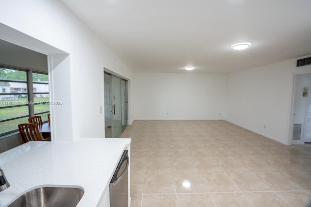 17252 SW 112th Pl Unit 21243, Miami, FL 33157 - kitchen with dishwasher, open floor plan, light stone countertops, and a sink