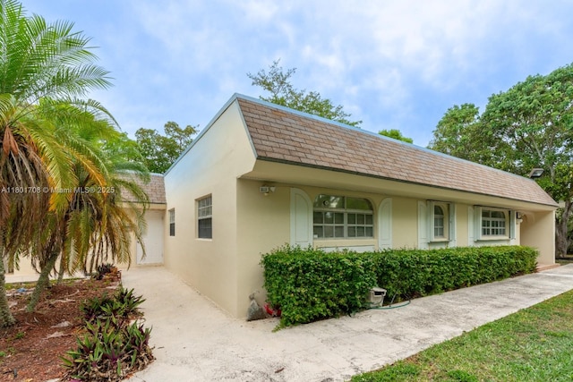 17252 SW 112th Pl Unit 21243, Miami, FL 33157 - view of front facade with stucco siding and a shingled roof