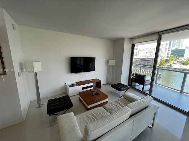 2600 E Hallandale Beach Blvd Unit T401, Hallandale Beach, FL 33009 - living room with floor to ceiling windows and tile patterned flooring