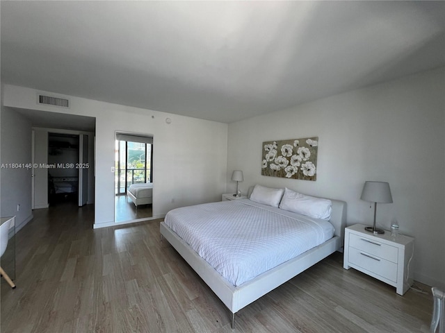2600 E Hallandale Beach Blvd Unit T401, Hallandale Beach, FL 33009 - bedroom featuring wood finished floors and baseboards