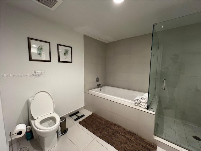 2600 E Hallandale Beach Blvd Unit T401, Hallandale Beach, FL 33009 - full bathroom featuring a shower stall, tile patterned floors, a bath, toilet, and baseboards
