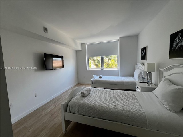 2600 E Hallandale Beach Blvd Unit T401, Hallandale Beach, FL 33009 - bedroom with light wood finished floors and baseboards