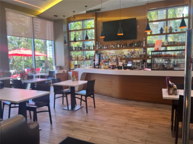 2600 E Hallandale Beach Blvd Unit T401, Hallandale Beach, FL 33009 - indoor dry bar featuring wood finished floors
