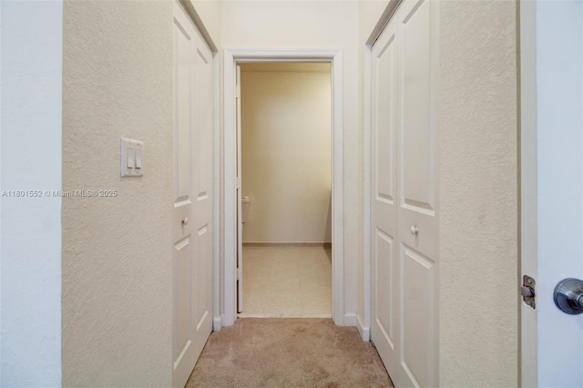 11094 W 33rd Way, Hialeah, FL 33018 - hall featuring a textured wall and carpet flooring