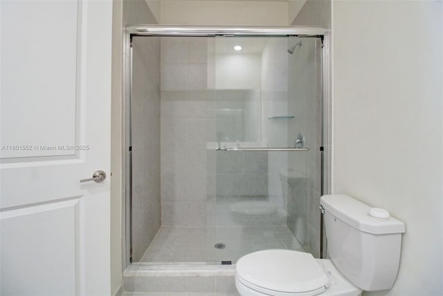 11094 W 33rd Way, Hialeah, FL 33018 - bathroom featuring toilet and a shower stall