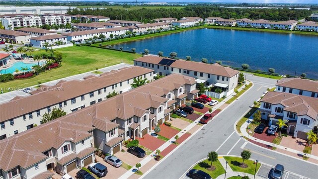 11094 W 33rd Way, Hialeah, FL 33018 - drone / aerial view of a pool area and a large body of water