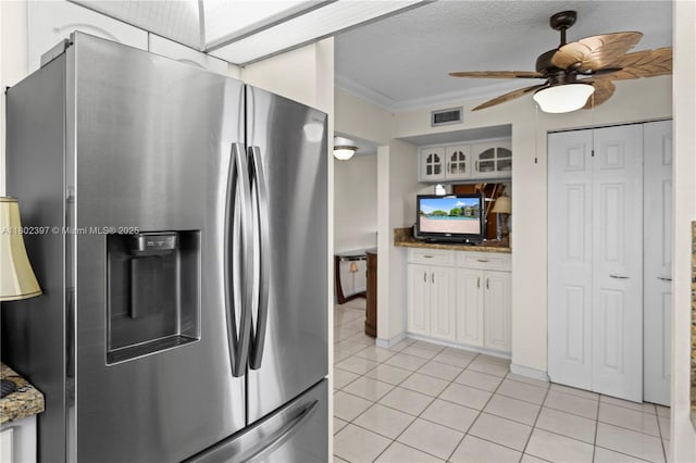900 Colony Point Cir Unit 523, Pembroke Pines, FL 33026 - kitchen featuring stainless steel fridge, light tile patterned floors, crown molding, white cabinetry, and a ceiling fan