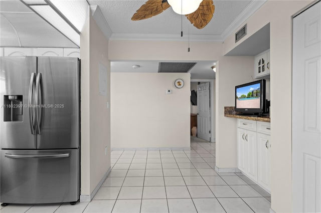 900 Colony Point Cir Unit 523, Pembroke Pines, FL 33026 - kitchen featuring stainless steel refrigerator with ice dispenser, crown molding, white cabinets, ceiling fan, and baseboards