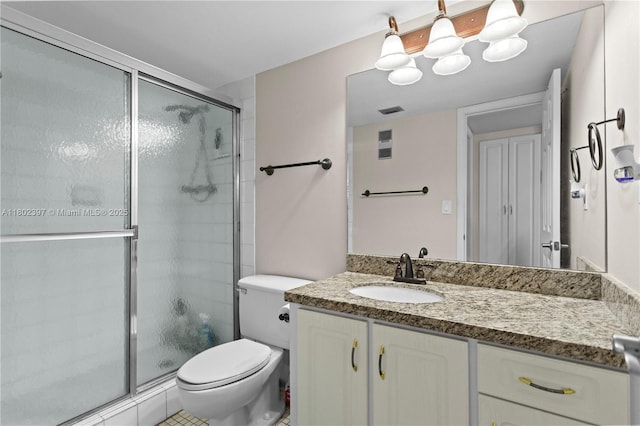 900 Colony Point Cir Unit 523, Pembroke Pines, FL 33026 - full bathroom featuring a shower stall, toilet, and vanity