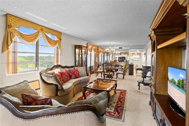 900 Colony Point Cir Unit 523, Pembroke Pines, FL 33026 - living area featuring a chandelier, light carpet, a textured ceiling, and ornamental molding