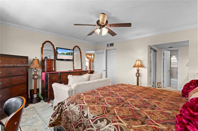 900 Colony Point Cir Unit 523, Pembroke Pines, FL 33026 - bedroom with crown molding, a textured ceiling, ensuite bath, a ceiling fan, and carpet