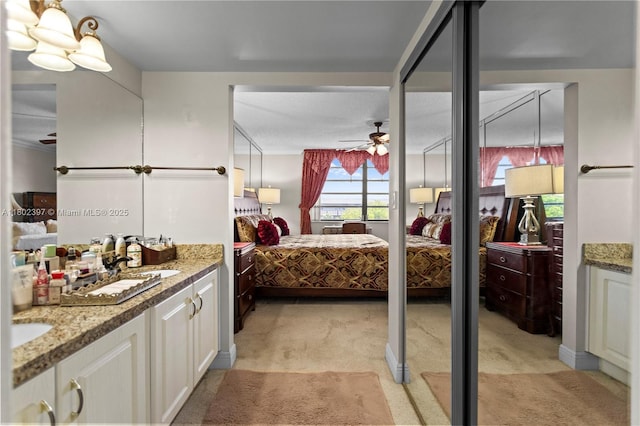 900 Colony Point Cir Unit 523, Pembroke Pines, FL 33026 - bedroom with light carpet and a sink