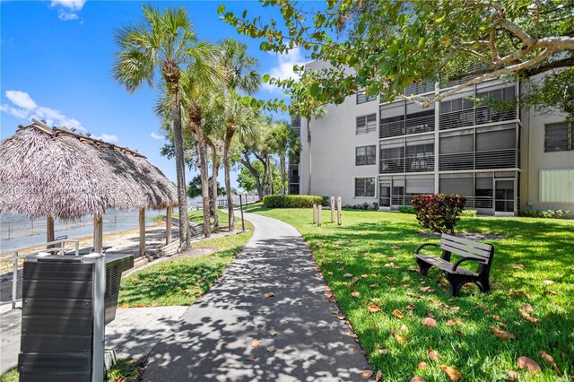 900 Colony Point Cir Unit 523, Pembroke Pines, FL 33026 - surrounding community featuring a dock, a yard, a gazebo, and a water view