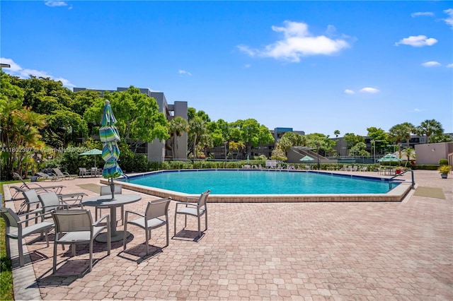 900 Colony Point Cir Unit 523, Pembroke Pines, FL 33026 - community pool featuring a patio area