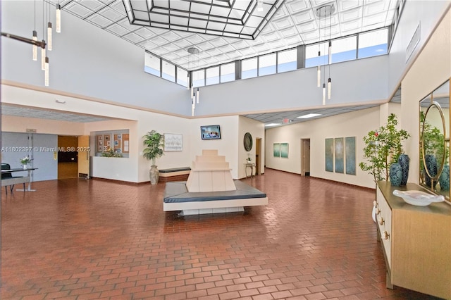 900 Colony Point Cir Unit 523, Pembroke Pines, FL 33026 - community lobby featuring a towering ceiling