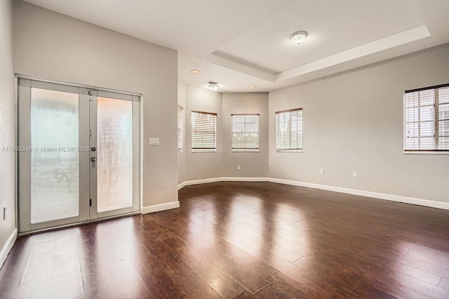 17668 SW 135th Ct, Miami, FL 33177 - empty room with healthy amount of natural light, baseboards, dark wood finished floors, and recessed lighting