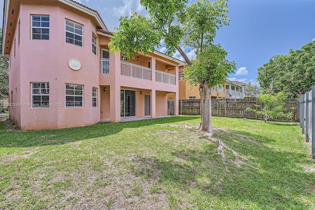 17668 SW 135th Ct, Miami, FL 33177 - rear view of property featuring stucco siding and a balcony