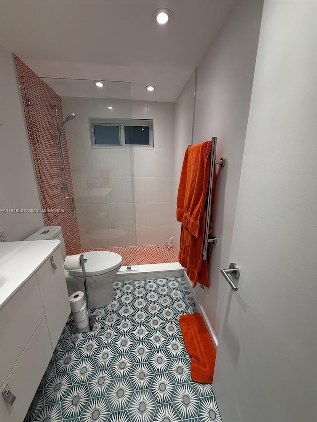 3209 S Ocean Dr Unit 2M, Hallandale Beach, FL 33009 - full bath with a tile shower, toilet, recessed lighting, vanity, and tile patterned flooring