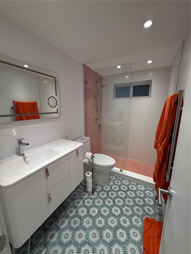 3209 S Ocean Dr Unit 2M, Hallandale Beach, FL 33009 - full bath with toilet, a tile shower, vanity, and recessed lighting