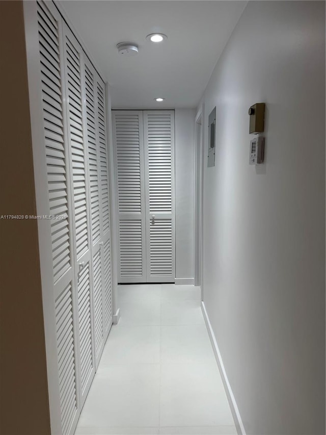 3209 S Ocean Dr Unit 2M, Hallandale Beach, FL 33009 - hallway featuring recessed lighting, tile patterned floors, and baseboards